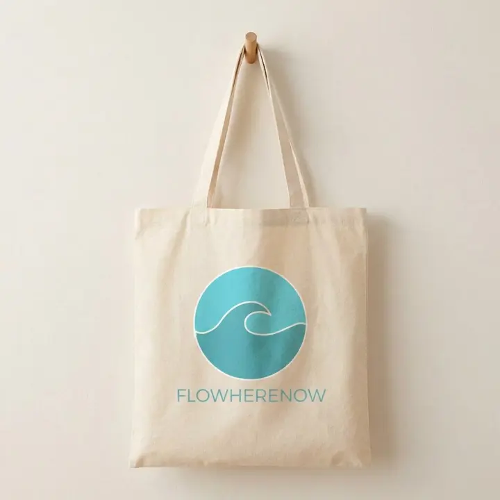 Wave Tote Bag in natural with the Flowherenow logo
